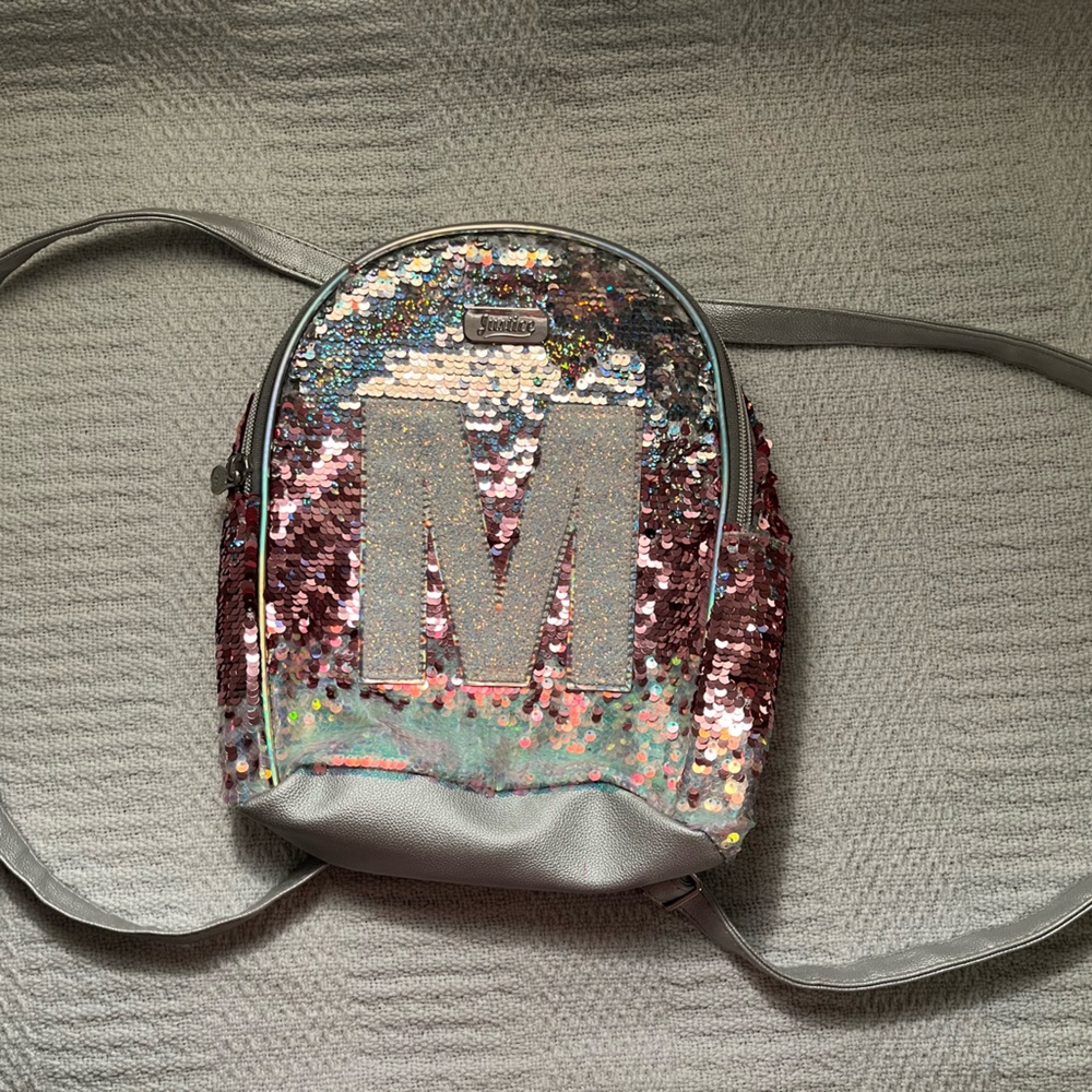 I’m selling a colorful sequin backpack with the letter M on it